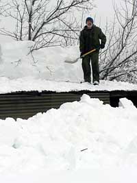 thom shoveling snow